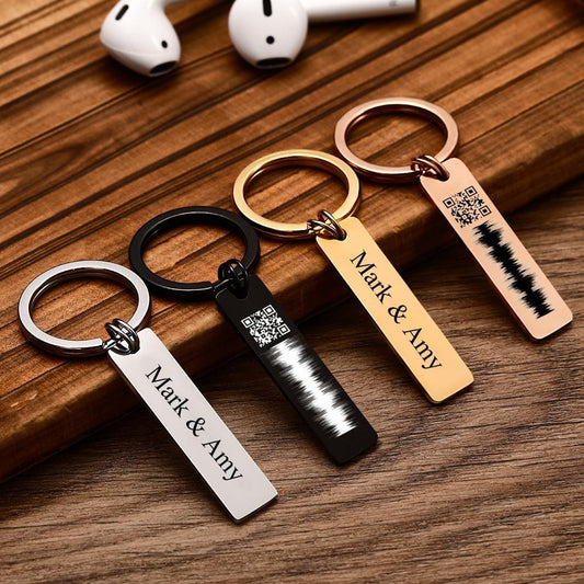 Personalised engraved stainless steel QR code audio keychain with name — close-up of front showing scannable QR linking to a custom audio message