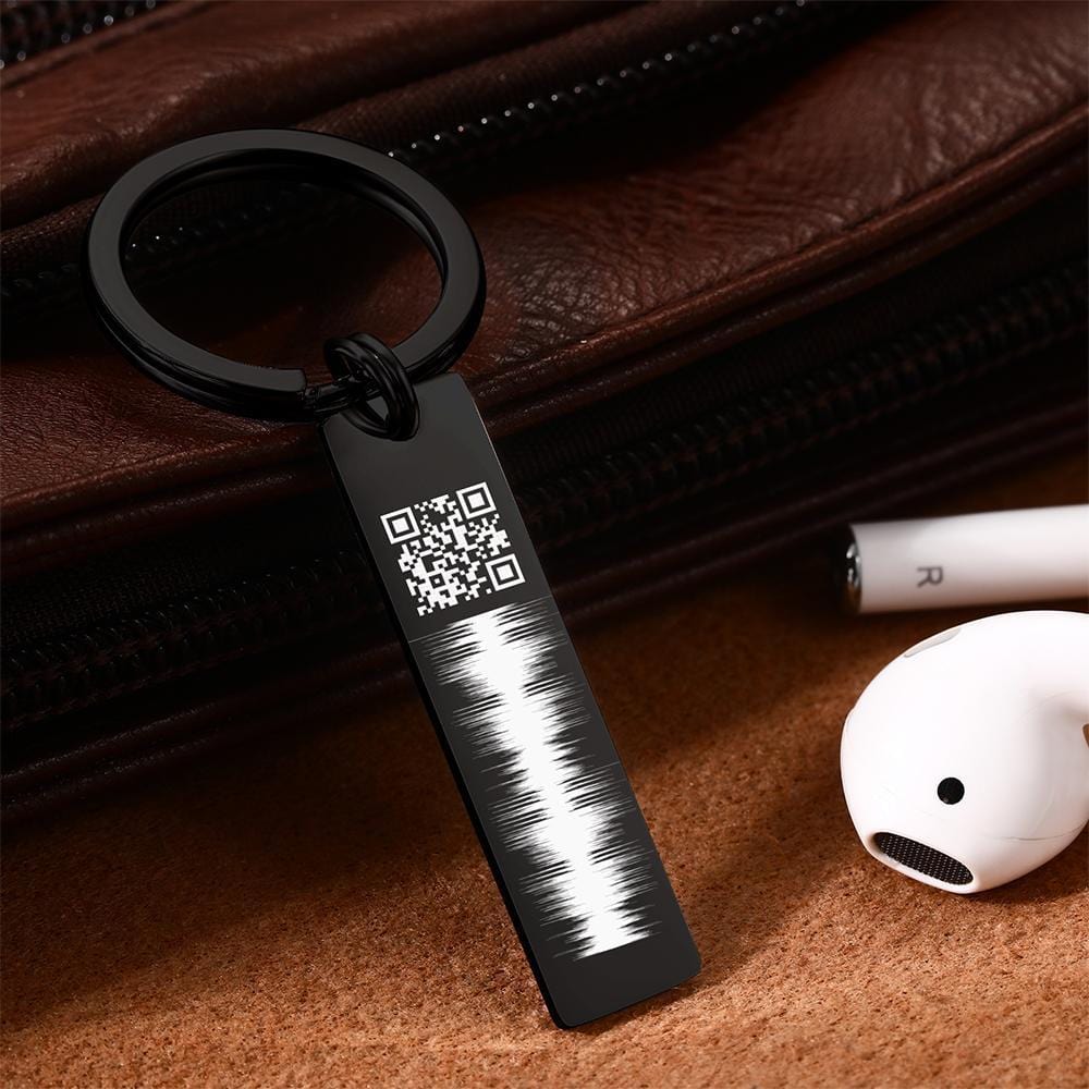 Personalised audio keyring attached to everyday keys — engraved QR code keychain that stores private spoken messages for loved ones