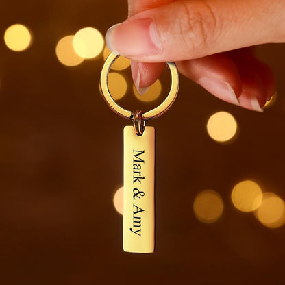 Double-sided engraved QR code keyring showing name engraving and scannable code — custom audio keepsake with eco-friendly finish