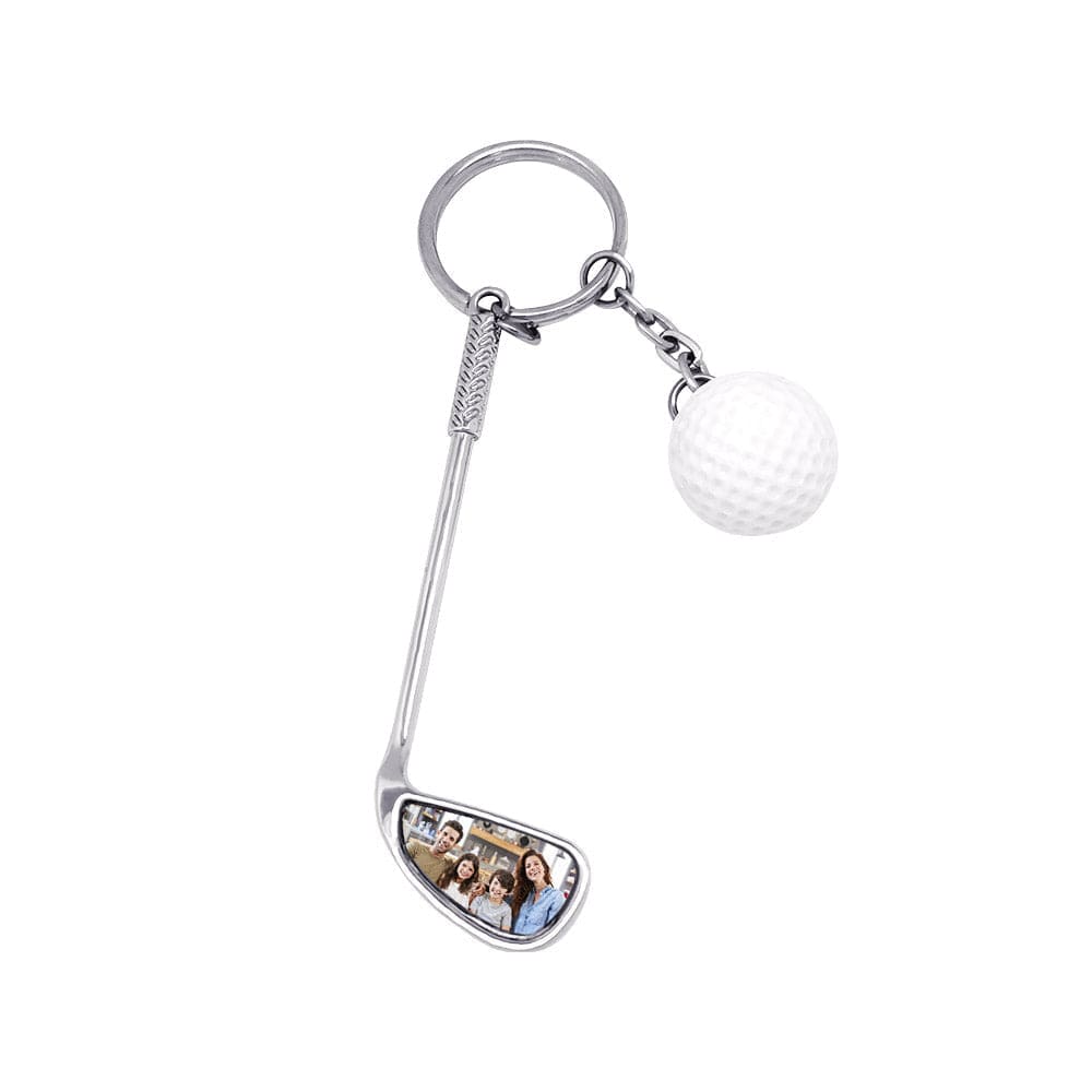 Custom golf ball keyring clipped to a bag ring, zinc alloy finish and lightweight 17.8g design — practical personalised gift for golfers