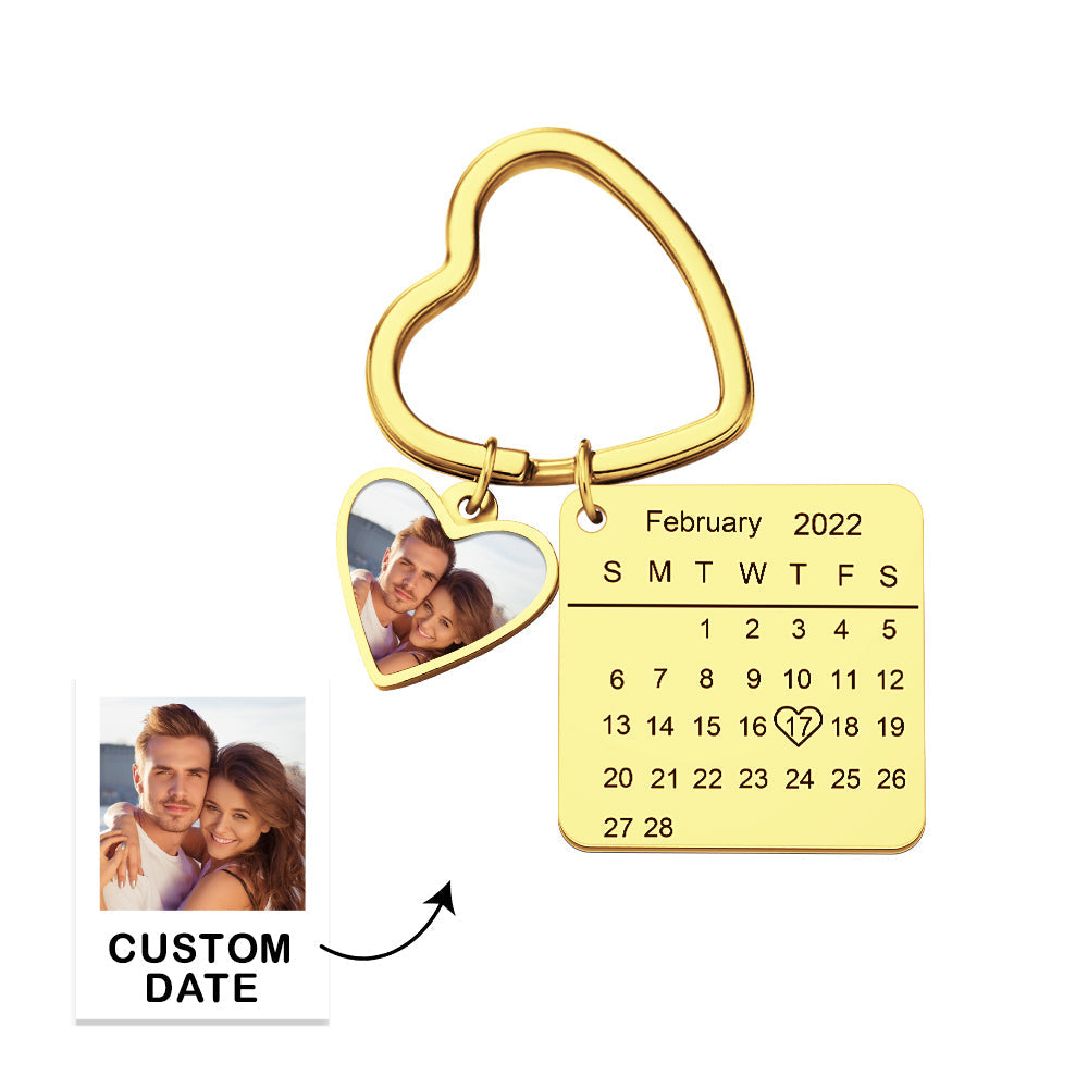 Personalised Photo Calendar Heart Keychain showing a heart pendant with engraved calendar and inserted photograph on a stylish keyring — save the date keyring gift for couples and anniversaries