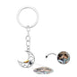 Hand-held Sun & Moon photo projection keyring in copper displaying sample projected image — thoughtful custom couple keepsake