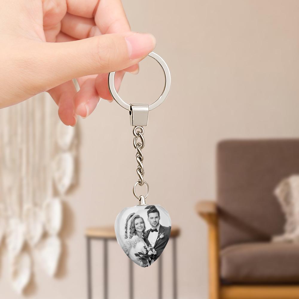 Personalised black and white photo crystal keyring attached as a bag charm on a handbag — compact, sentimental accessory and perfect graduation or teacher gift