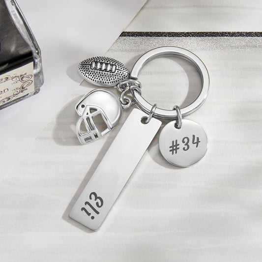Personalised hand-stamped football keychain with custom engraved name on metal tag and split ring – perfect football gift