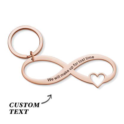 Close-up of personalised engraved infinity keyring showing crisp custom text and hollow-out infinity motif