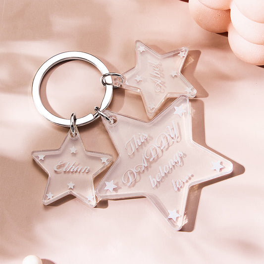 Personalised engraved star keychain attached to keys, demonstrating practical everyday use as a unique custom keyring and memorable gift for weddings or anniversaries
