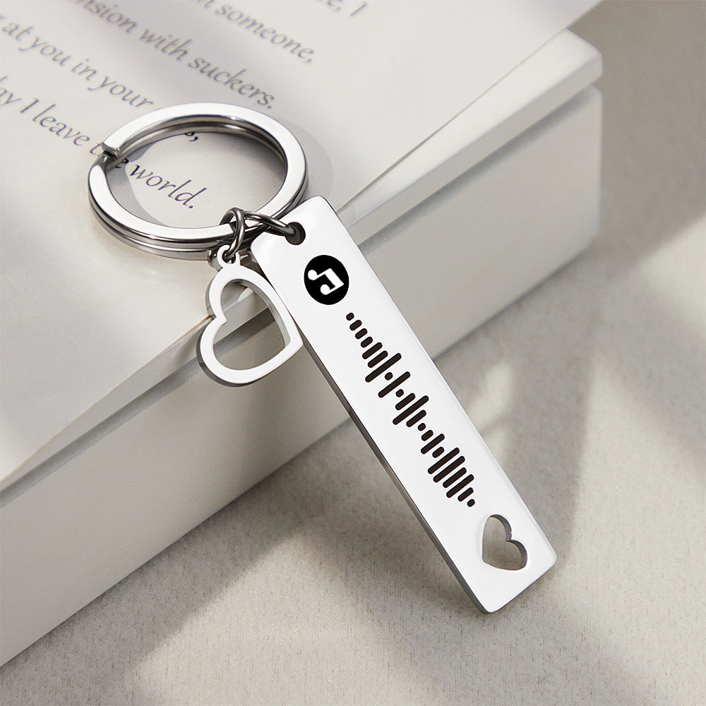 Detailed close-up of engraved text and scannable music code on a personalised heart keyring — perfect for Valentine’s, Mother’s Day or graduation gifts.