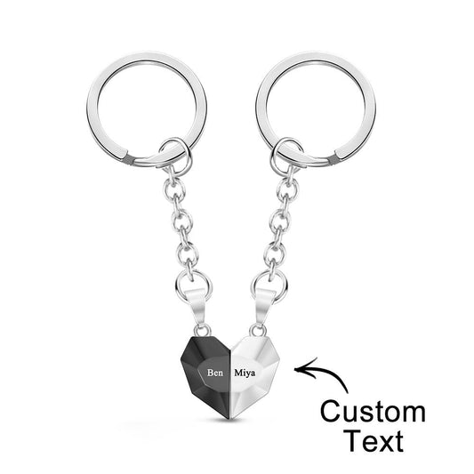 Personalised engraved magnetic matching heart keychains joined together — ornate jewellery-style keyrings as an anniversary gift for couples with custom names or date