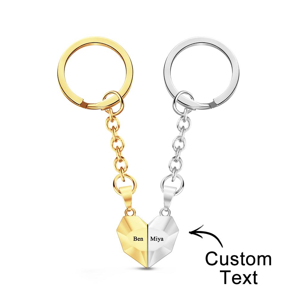 Close-up of personalised engraved magnetic matching heart keychains showing romantic engraved message 'We are destined to be together' — keepsake anniversary present for couples