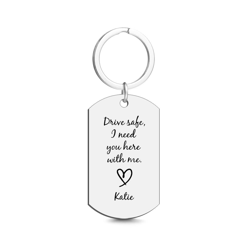 Close-up of custom tag keyring showing polished metal finish and precision engraving on a personalised photo keyring