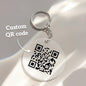 Close up of personalised scannable QR code on acrylic keychain highlighting crisp engraving and how the QR links to video audio or custom text