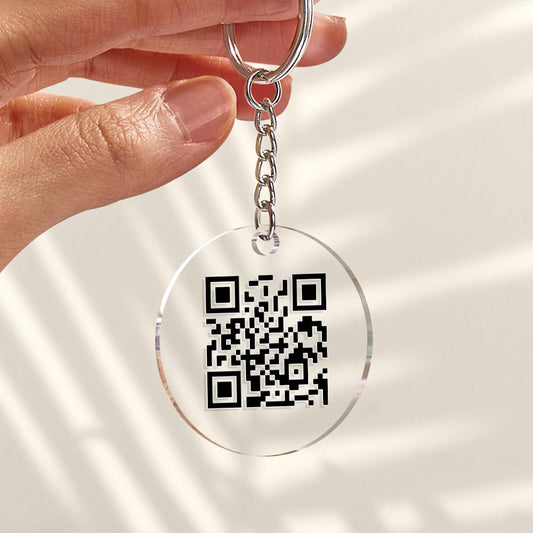 Close up of personalised scannable QR code on acrylic keychain highlighting crisp engraving and how the QR links to video audio or custom text