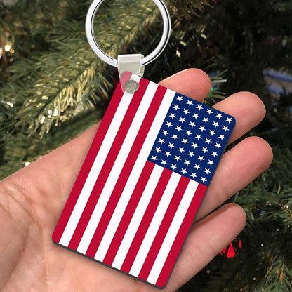 Close-up of American flag motif on stainless steel personalised keyring showing engraved initials and brushed finish