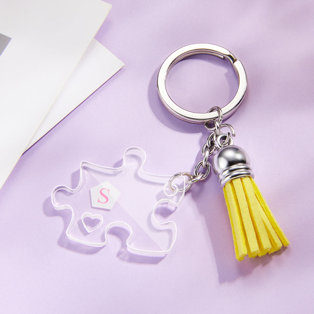 Close-up of personalised puzzle keyring halves, laser-engraved detail on acrylic jigsaw pieces – personalised puzzle keyring and jigsaw puzzle couple keychains showcasing split‑piece connection