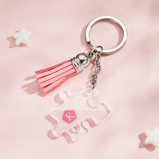Lifestyle image of personalised jigsaw puzzle keyring attached to keys, lightweight acrylic keepsake styled as a couple keychain gift for him or her for anniversaries, weddings and Valentine’s Day