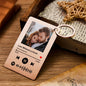 Close-up of scannable Spotify code and photo engraving on stainless steel keychain — personalised music gift idea