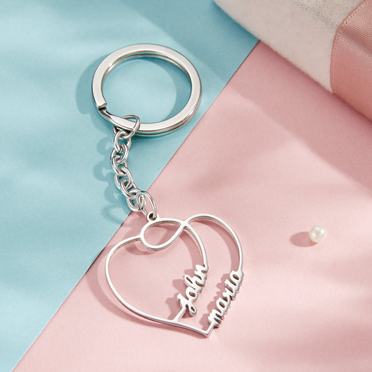 Custom engraved double heart keyring displayed on white background – personalised gift for wife, husband or fiancé