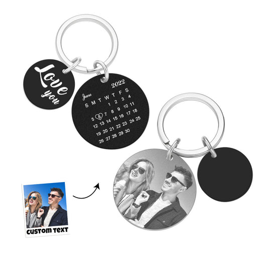 Close‑up of engraved dog tag keychain on a set of keys displaying a personalised date and short text — meaningful personalised anniversary keyring and gift for husband