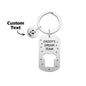 Front view of 'Daddy's Dream Team' engraved football charm and custom name bar on stainless steel keyring – personalised gift for dad