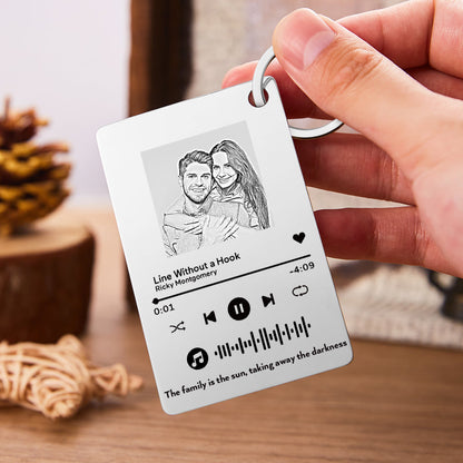 Personalised music code keyring laid flat showing durable, tarnish-resistant stainless steel finish and precision engraved scannable music code
