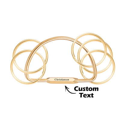 Detailed view of the layered charm edge and secure split ring showcasing durable stainless steel construction — high-quality personalised keychain.