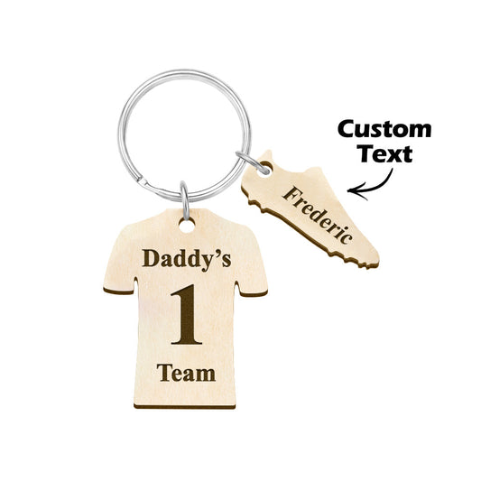 Personalised Daddy's Football Team engraved keyring on wooden sports-style display — stainless steel charm, custom name keyring for Father's Day