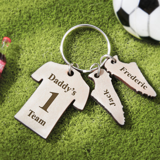 Personalised Daddy's Football Team engraved keyring on wooden sports-style display — stainless steel charm, custom name keyring for Father's Day