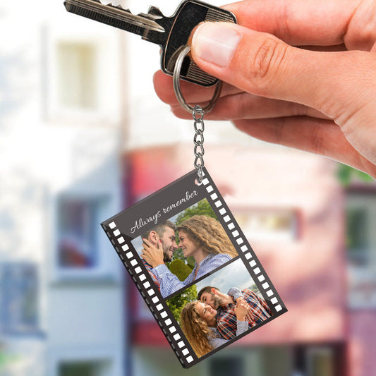 Personalised film strip photo acrylic keyring with two photos and custom text on clear acrylic, UV-printed and attached to a sturdy metal keyring