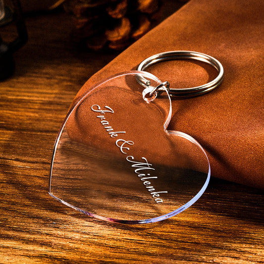 Selection of personalised acrylic engraved keychains displaying different fonts, finishes and custom text options for a bespoke photo gift