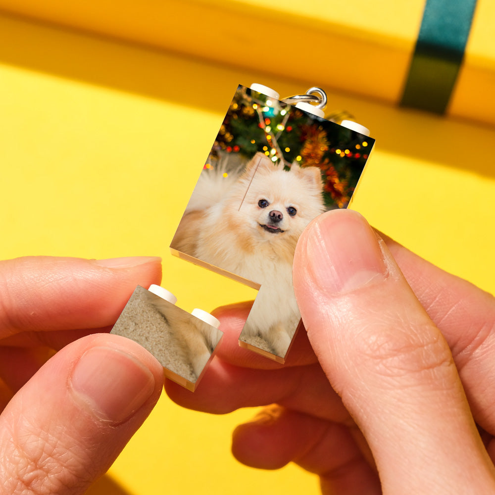 Close-up personalised photo brick puzzle keyring featuring a baby image and detachable interlocking bricks