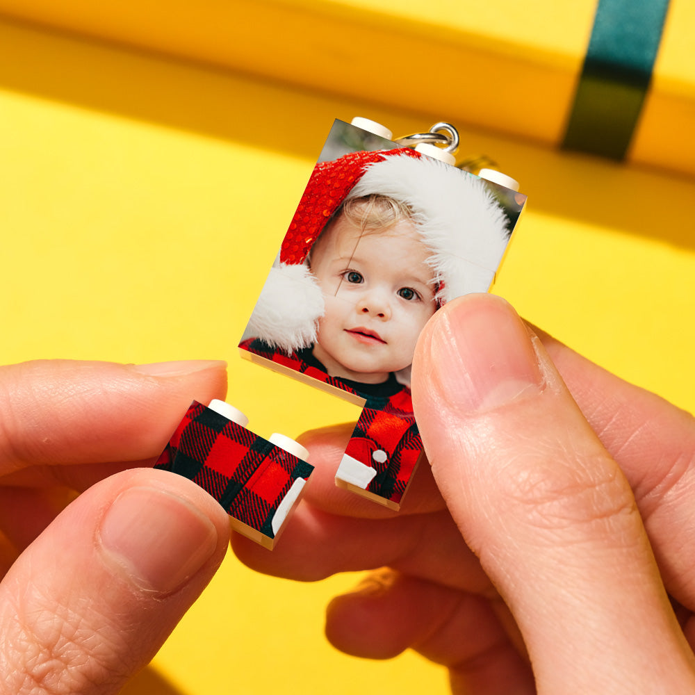 Personalised photo bricks displayed wall-mounted as a vertical photo keychain – custom puzzle keyring