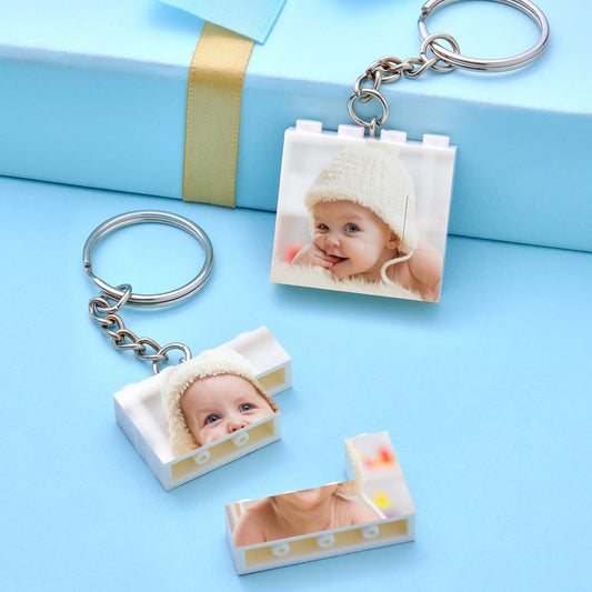 Personalised Photo Building Block Keyring mounted on wall as interactive puzzle-style photo display with colourful UV print