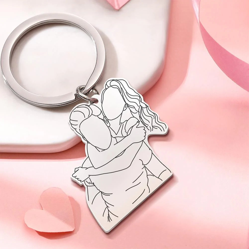 Close-up of hand-drawn 3D line art engraving on stainless steel personalised keychain with keyring attachment