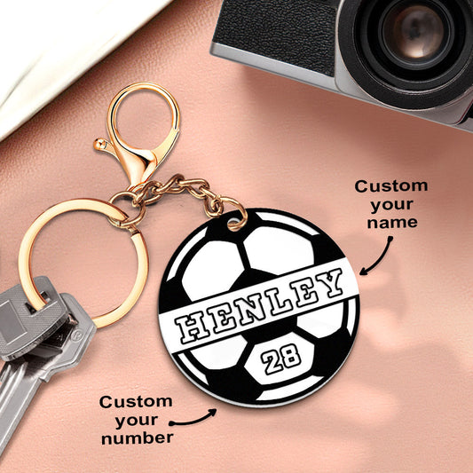 Personalised soccer keychain with custom name and jersey number on clear acrylic tag — football keyring gift for players and fans