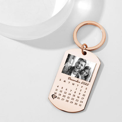 Detailed packshot of the personalised calendar plate on a black keyring highlighting print quality and budget-friendly personalised gift option.