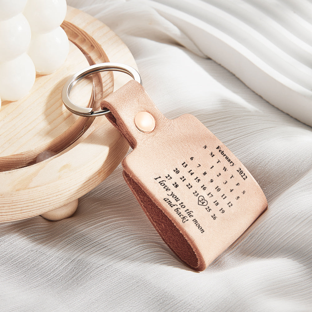Alternate angle of personalised calendar leather keyring highlighting leather texture, stitching and engraved date — personalised engraved keyring for birthdays, weddings and anniversaries