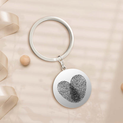 Rear view of the round engraved keyring showing the custom text engraving area and high‑quality finish of the personalised keepsake