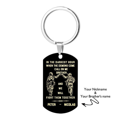 Keyring pictured as a bag tag attached to a leather bag — personalised stainless steel engraved tag ideal as a thoughtful accessory.