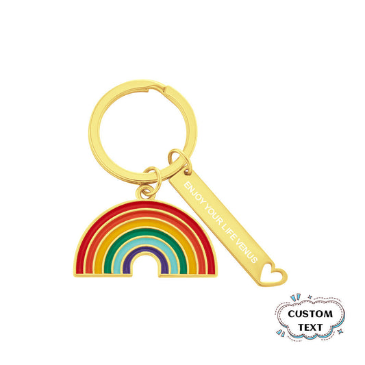 Personalised gold rainbow pendant keyring on white background – bedazzled alloy with gold finish, engraved keyring gift for him or her
