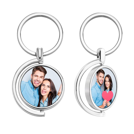 Flat-lay of personalised spinning photo keyrings highlighting premium metal construction and custom photo keepsake — thoughtful wedding or memorial gift