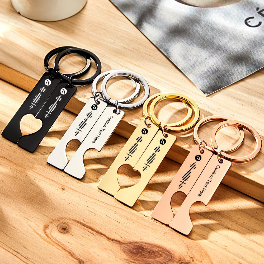 Four variation set of heart cut‑out Spotify code keychains in stainless steel – personalised designs for gifting