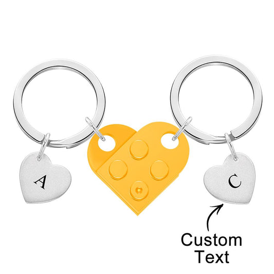Hand-held view of the assembled matching heart keychain – engraved couples keepsake perfect for anniversaries and long-distance partners
