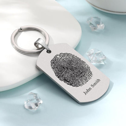 Personalised photo and fingerprint keychain held in hand to show scale and premium build — everyday personalised gift for boyfriend
