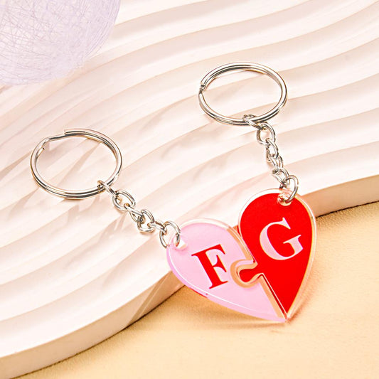 Set of two personalised heart keyrings attached to keys and bag personalised initials matching puzzle keyring perfect for Valentine's Day or anniversary