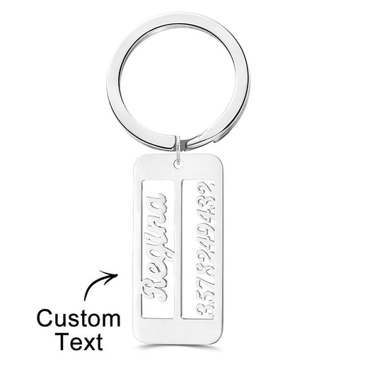 Personalised emergency contact keyring, custom engraved with a name and phone number on a durable silver metal keychain.