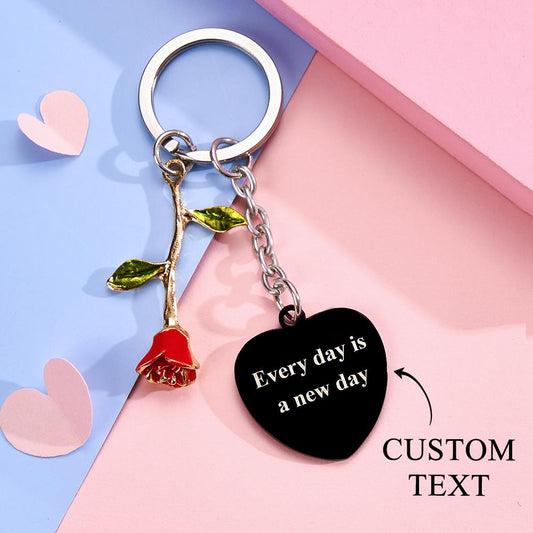 Styled shot of personalised rose pendant heart keyring on keys to show scale — stylish engraved photo or music keepsake, great for graduation, Christmas or anniversary gifts for her