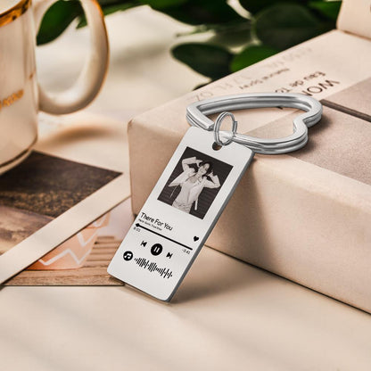 Close-up of durable engraving and polished finish on a photo scannable code keyring, clear scannable music code for a personalised song or playlist