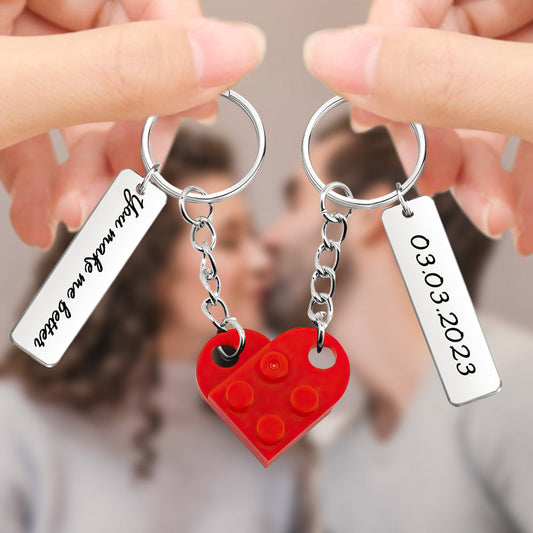 Personalised Matching Couples Heart Brick Keyrings showing two engraved heart halves joined together, custom engraved names and date for an anniversary or Valentine's gift