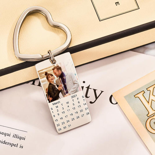 Silver stainless steel personalised calendar photo keyring showing a clear printed portrait and mini calendar — custom calendar keychain keepsake