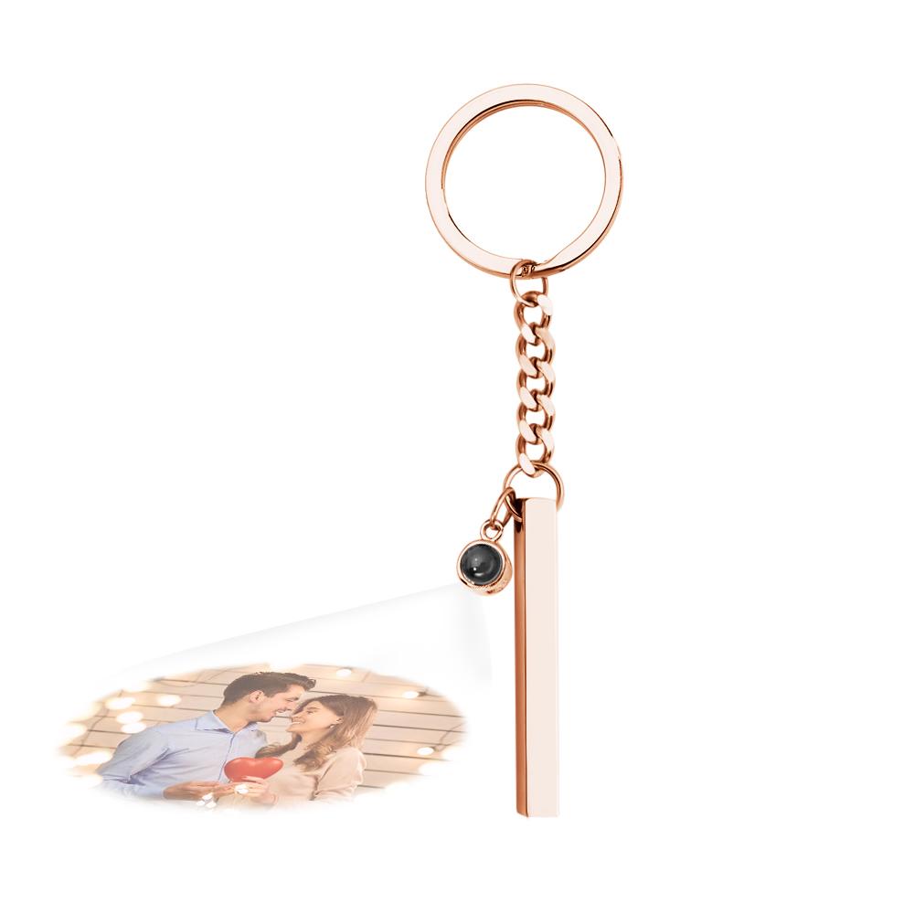 Engraved cube pendant keyring presented on a neutral background, emphasising the polished metal and customisation area – personalised photo gift